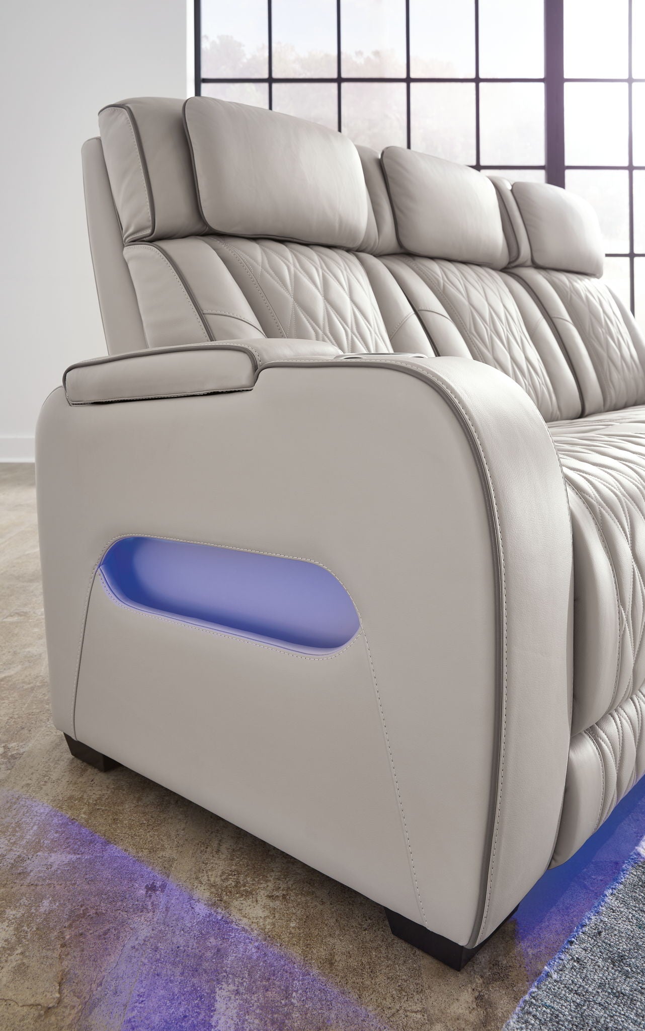 Boyington - Power Reclining Loveseat With Console/Adj Hdrst - Hornell Furniture Outlet
