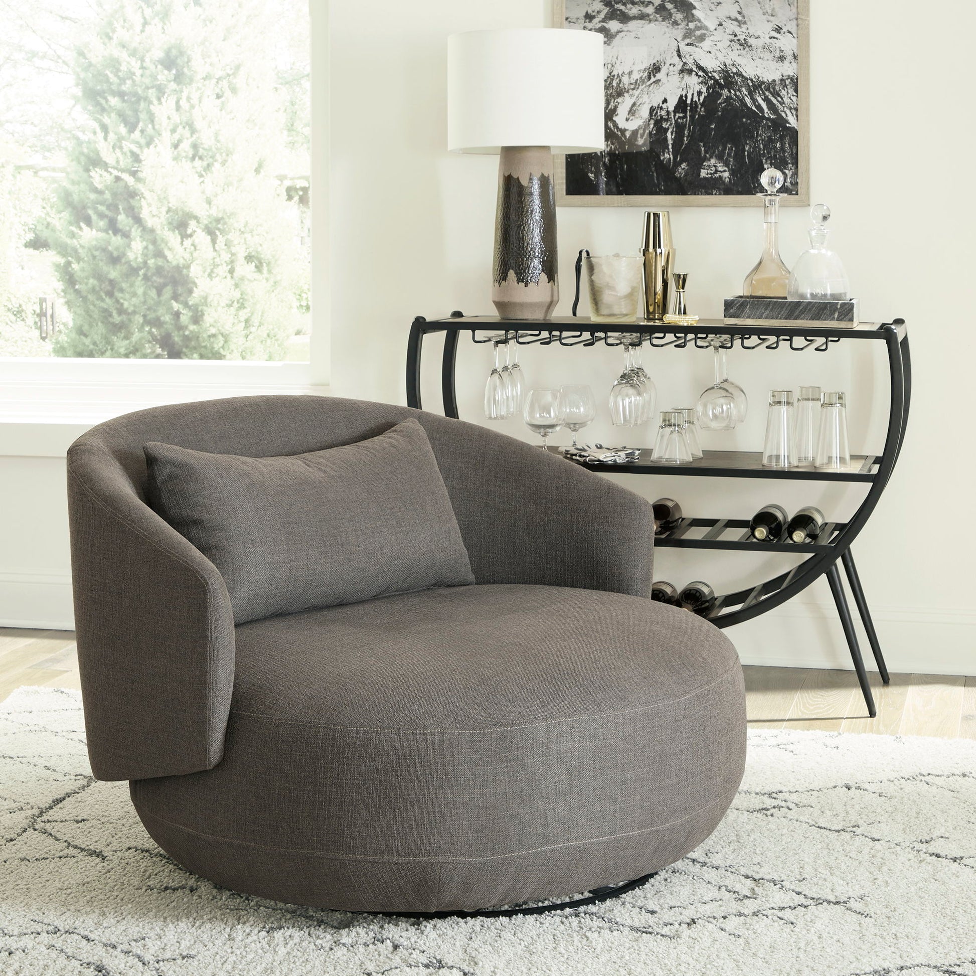 Haley - Upholstered Swivel Cuddler Chair - Hornell Furniture Outlet