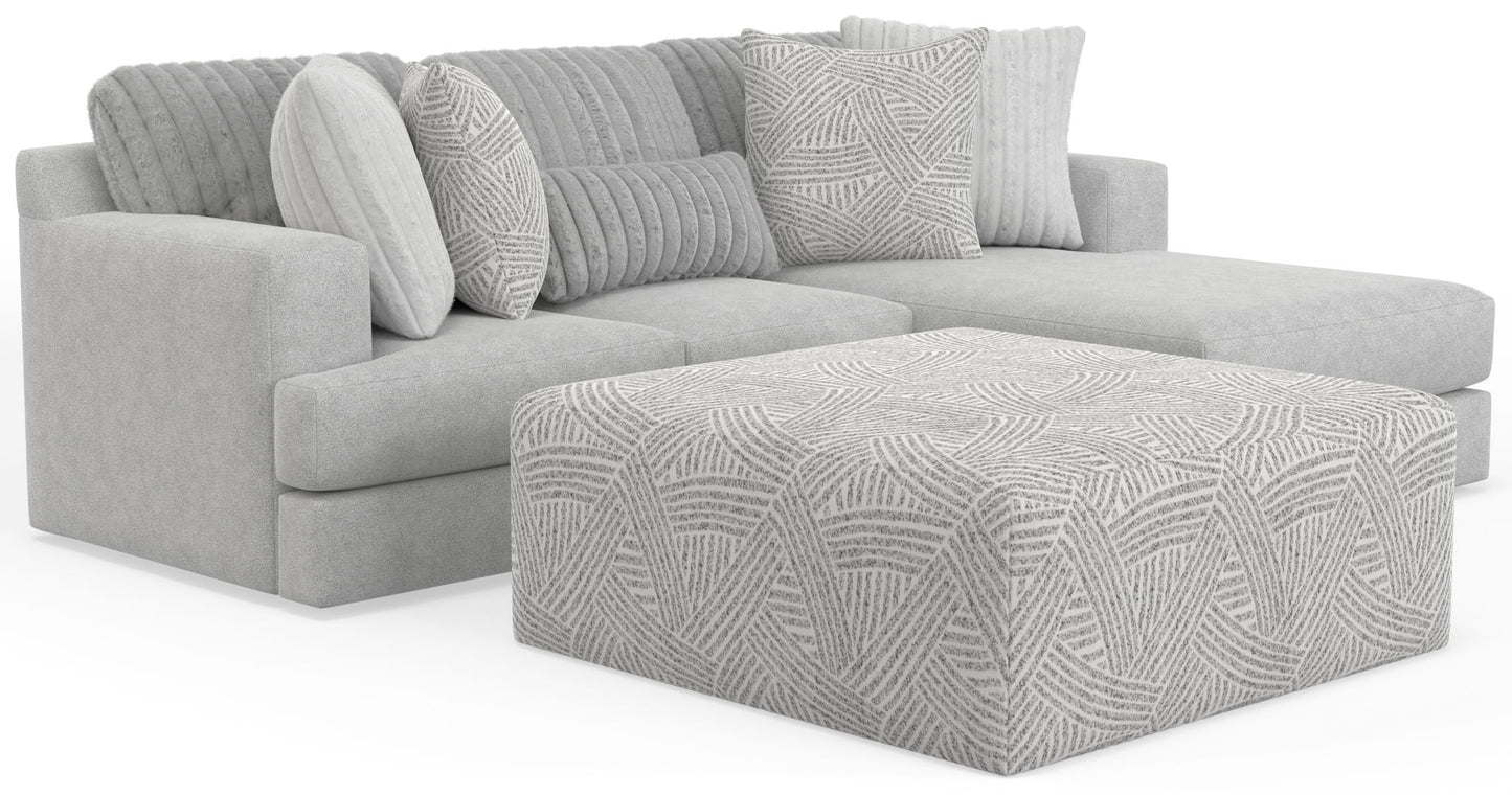 Logan - Upholstered Sectional With Comfort Coil Seating - 46" Cocktail Ottoman And Accent Pillows Included - Hornell Furniture Outlet