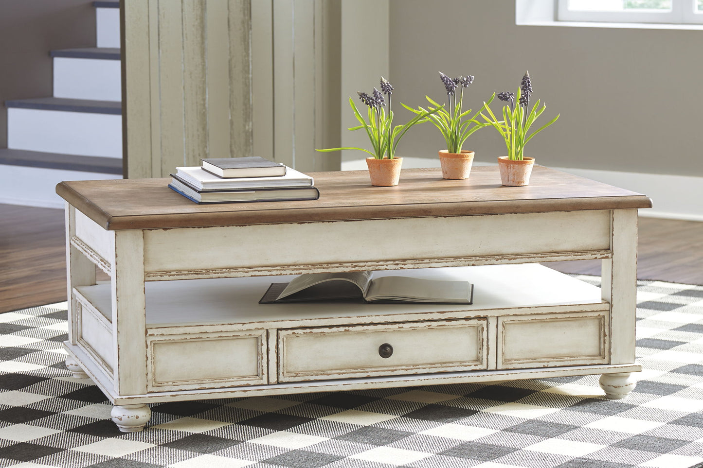 Realyn - White / Brown - Lift Top Cocktail Table - Hornell Furniture Outlet