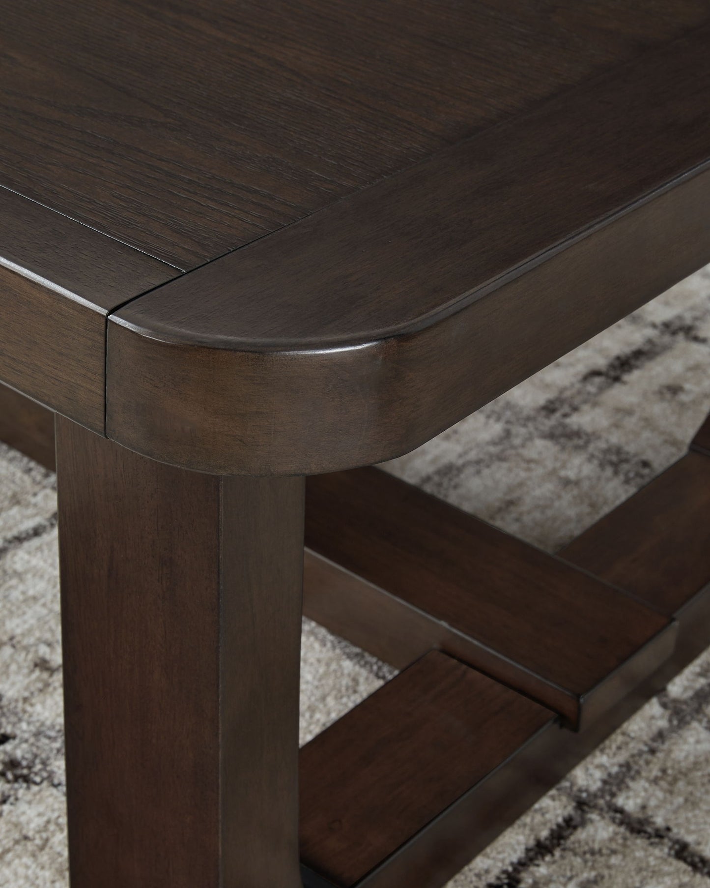 Breckington - Dark Brown - Rectangular Cocktail Table - Hornell Furniture Outlet