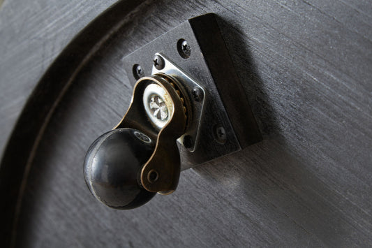 Dyonton - Light Grayish Brown - Round Cocktail Table - Hornell Furniture Outlet