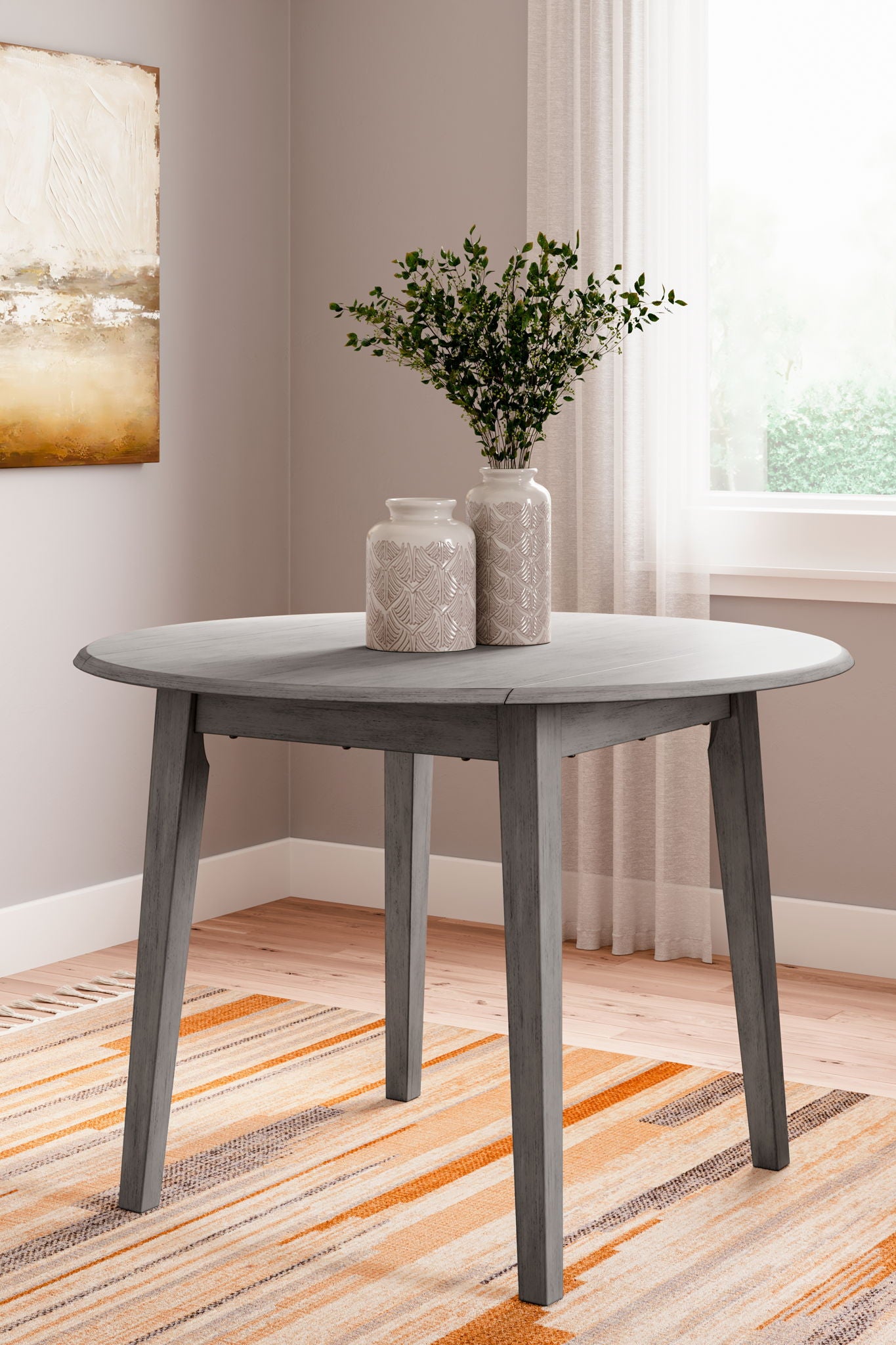 Shullden - Gray - Round Drm Drop Leaf Table - Hornell Furniture Outlet