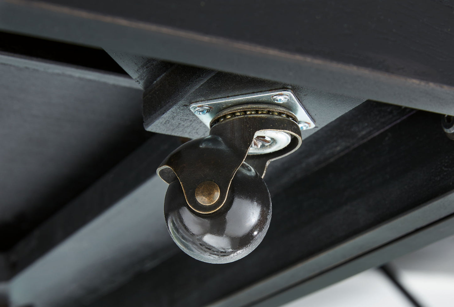 Winbardi - Black - Oval Cocktail Table - Hornell Furniture Outlet