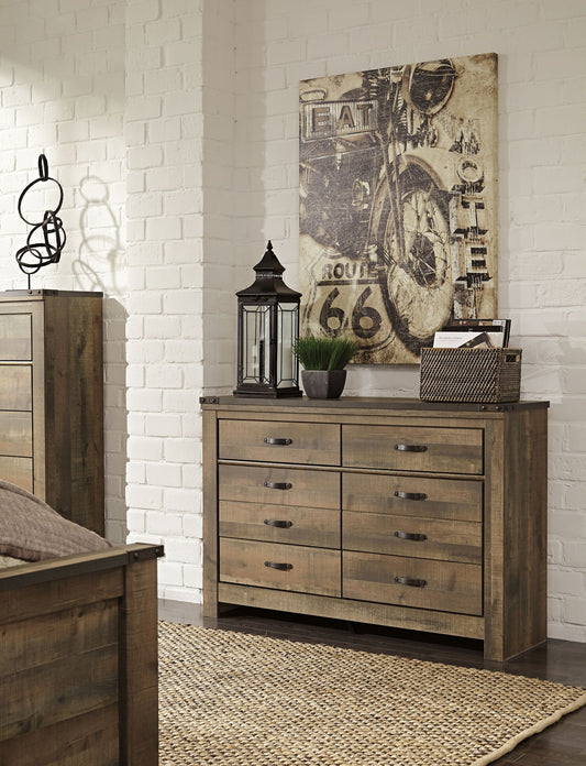 Trinell - Six Drawer Dresser - 61.34" x 15.98" x 42.99" - Brown Dark - Hornell Furniture Outlet