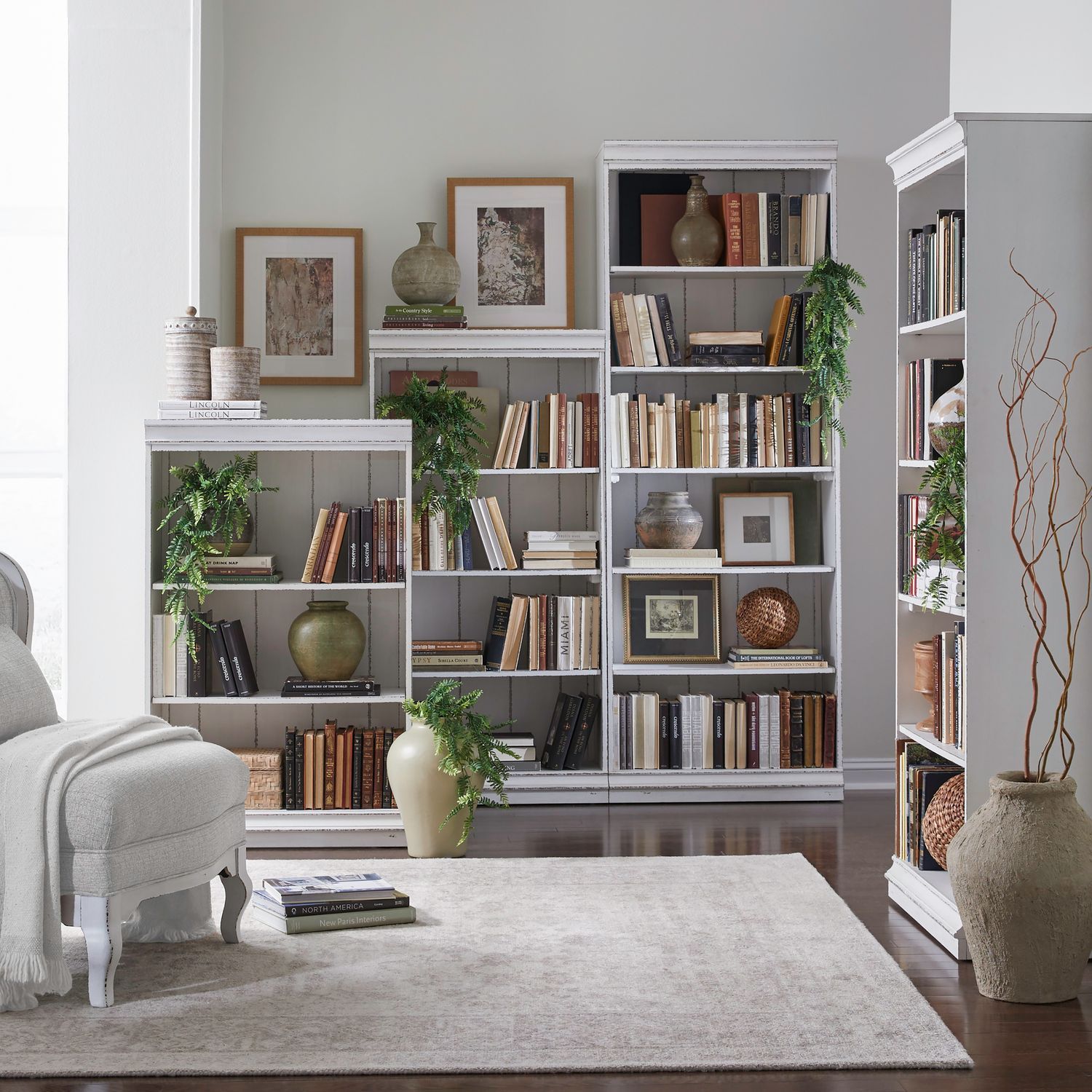 Magnolia Manor - 4 Piece Stepped Bookcase Set - White - Hornell Furniture Outlet