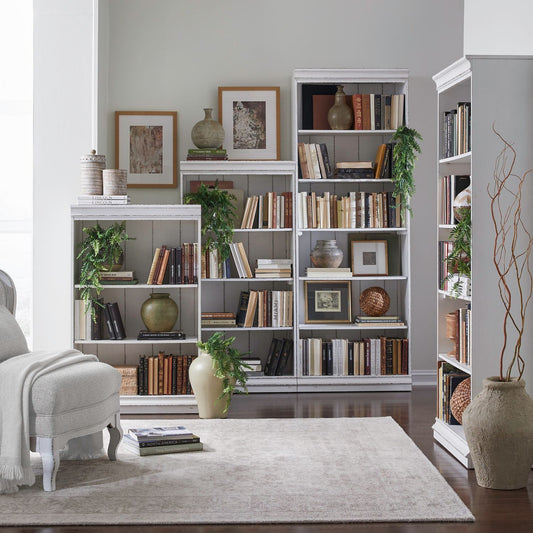 Magnolia Manor - 4 Piece Stepped Bookcase Set - White - Hornell Furniture Outlet