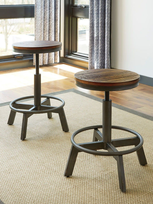 Torjin - Dark Brown - 3 Pc. - Long Counter Table, 2 Stools - Hornell Furniture Outlet