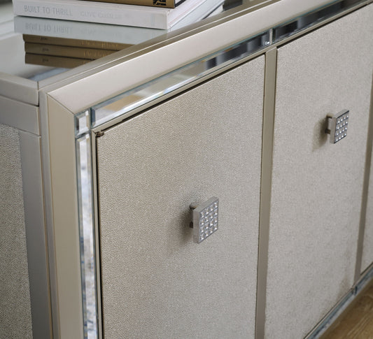 Chaseton - Champagne - Accent Cabinet - Hornell Furniture Outlet