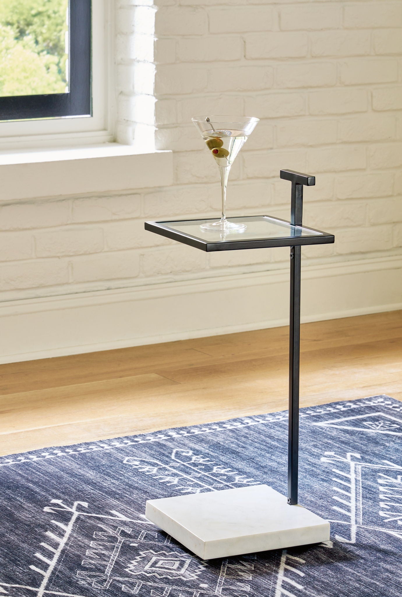 Mannill - Black / White - Accent Table - Hornell Furniture Outlet