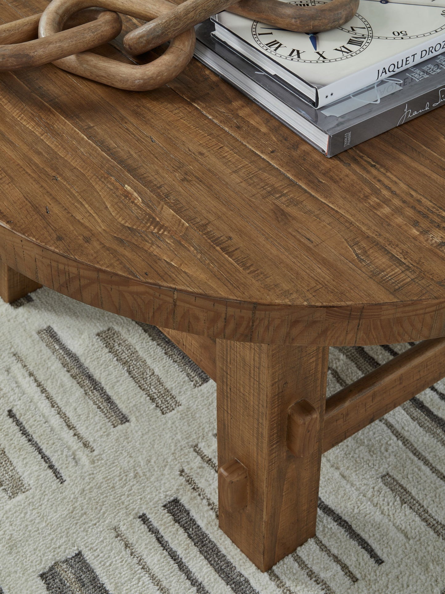 Mackifeld - Warm Brown - Round Cocktail Table - Hornell Furniture Outlet
