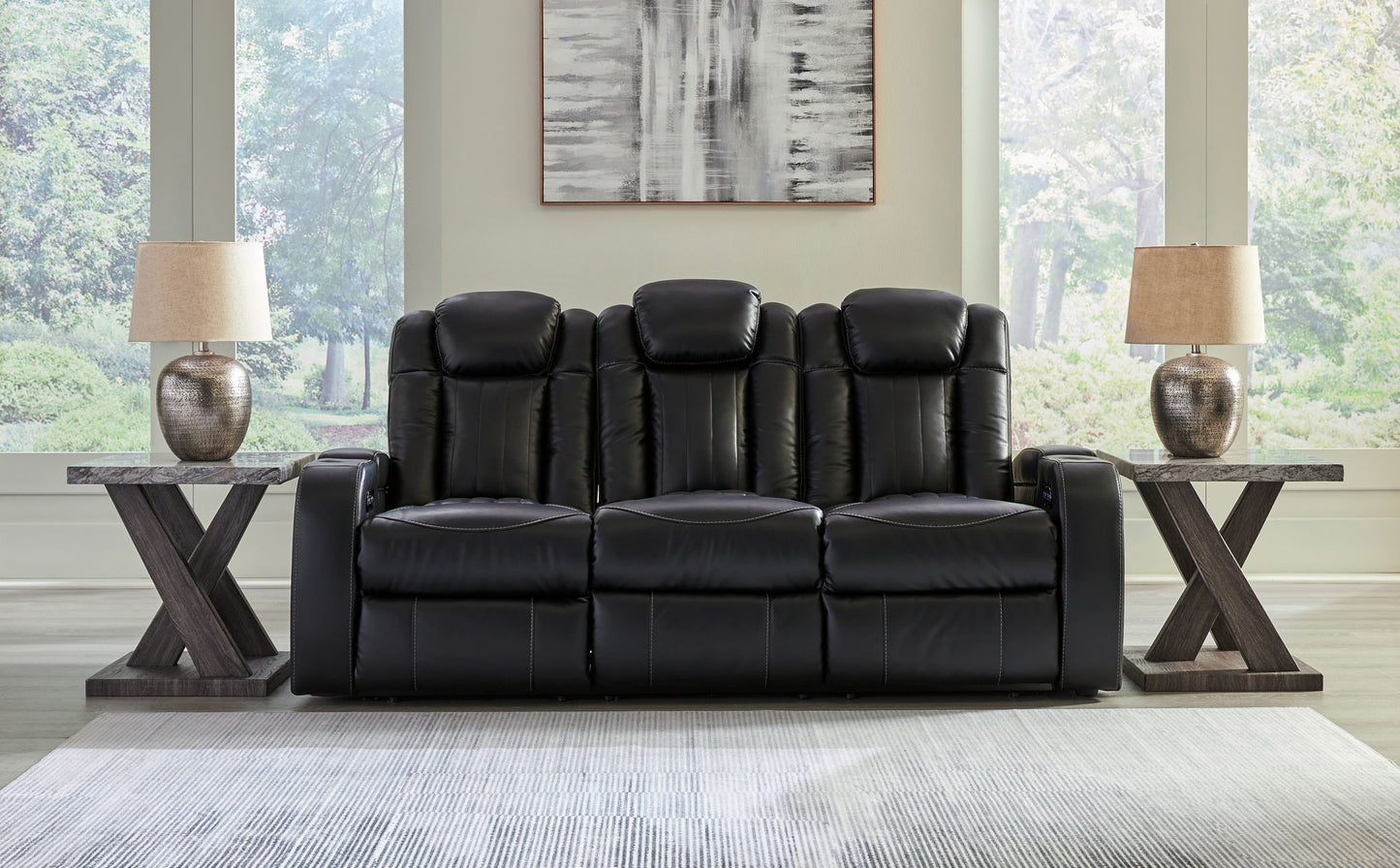 Caveman Den - Midnight - Power Reclining Sofa With Adj Headrest - Hornell Furniture Outlet