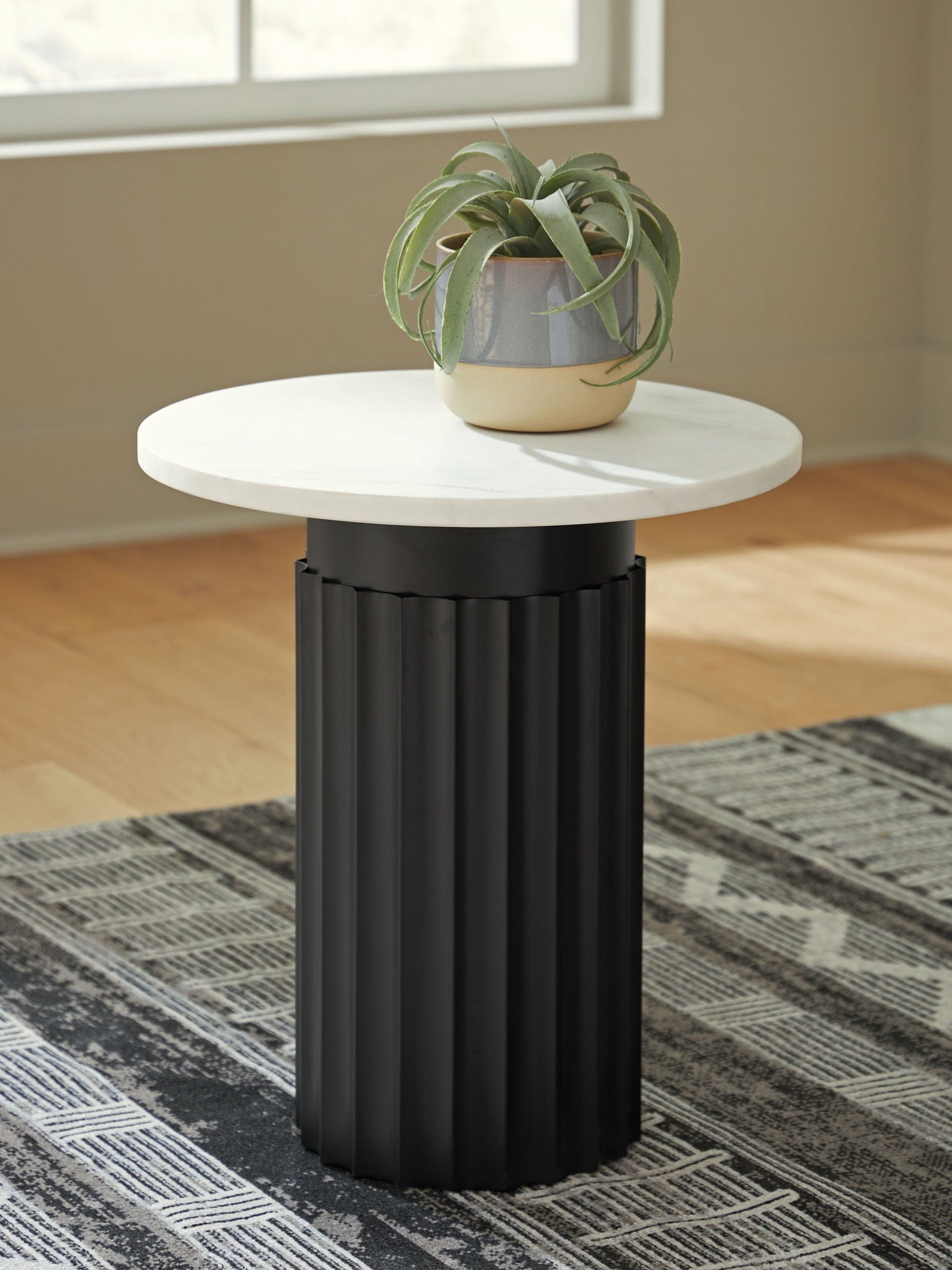 Wainstone - Black / White - Accent Table - Hornell Furniture Outlet