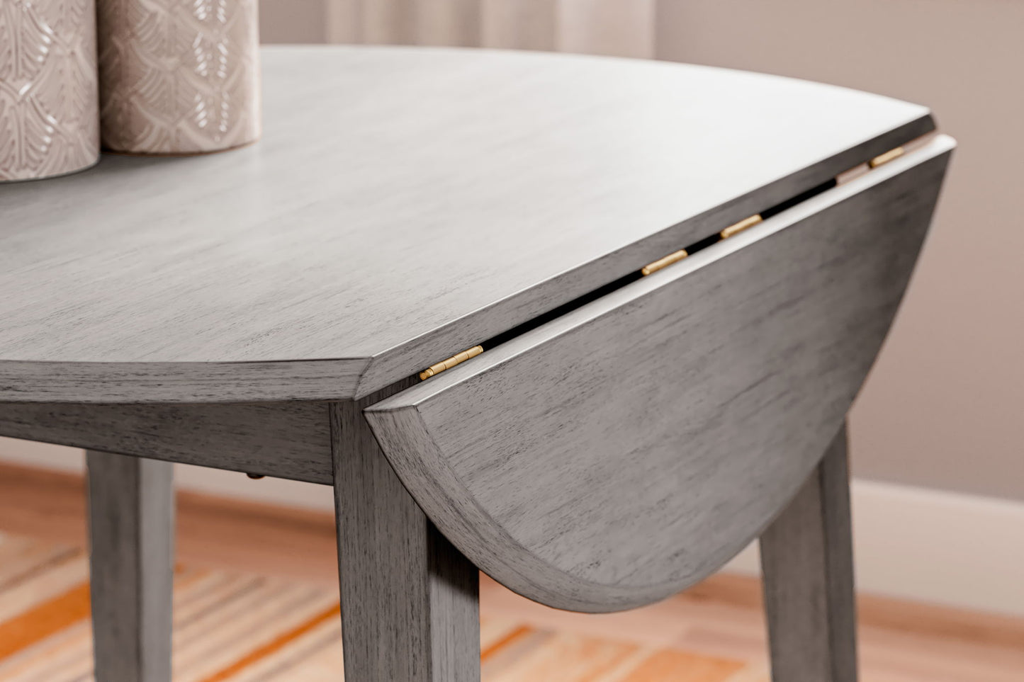 Shullden - Gray - Round Drm Drop Leaf Table - Hornell Furniture Outlet