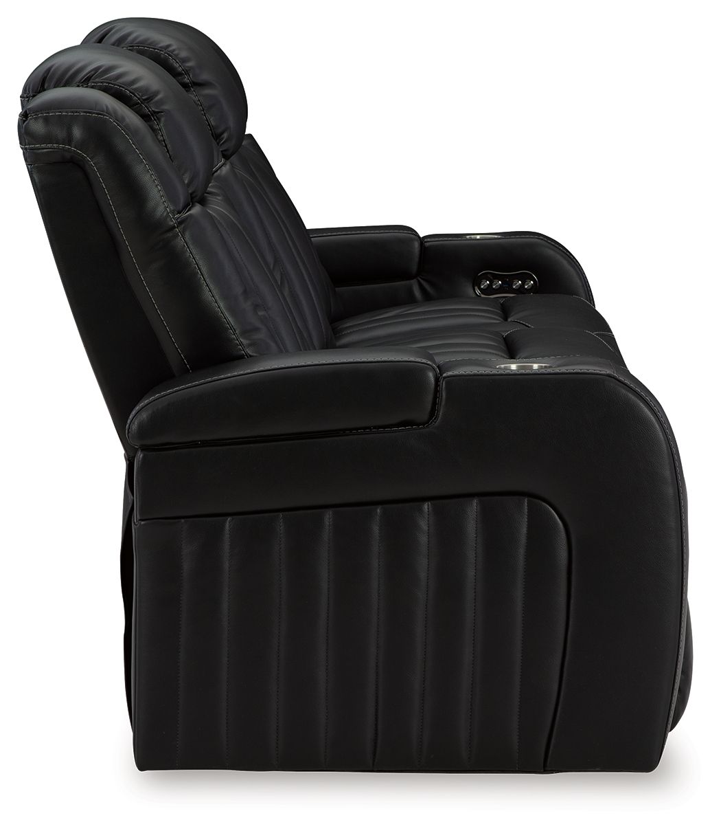 Caveman Den - Midnight - Power Reclining Sofa With Adj Headrest - Hornell Furniture Outlet
