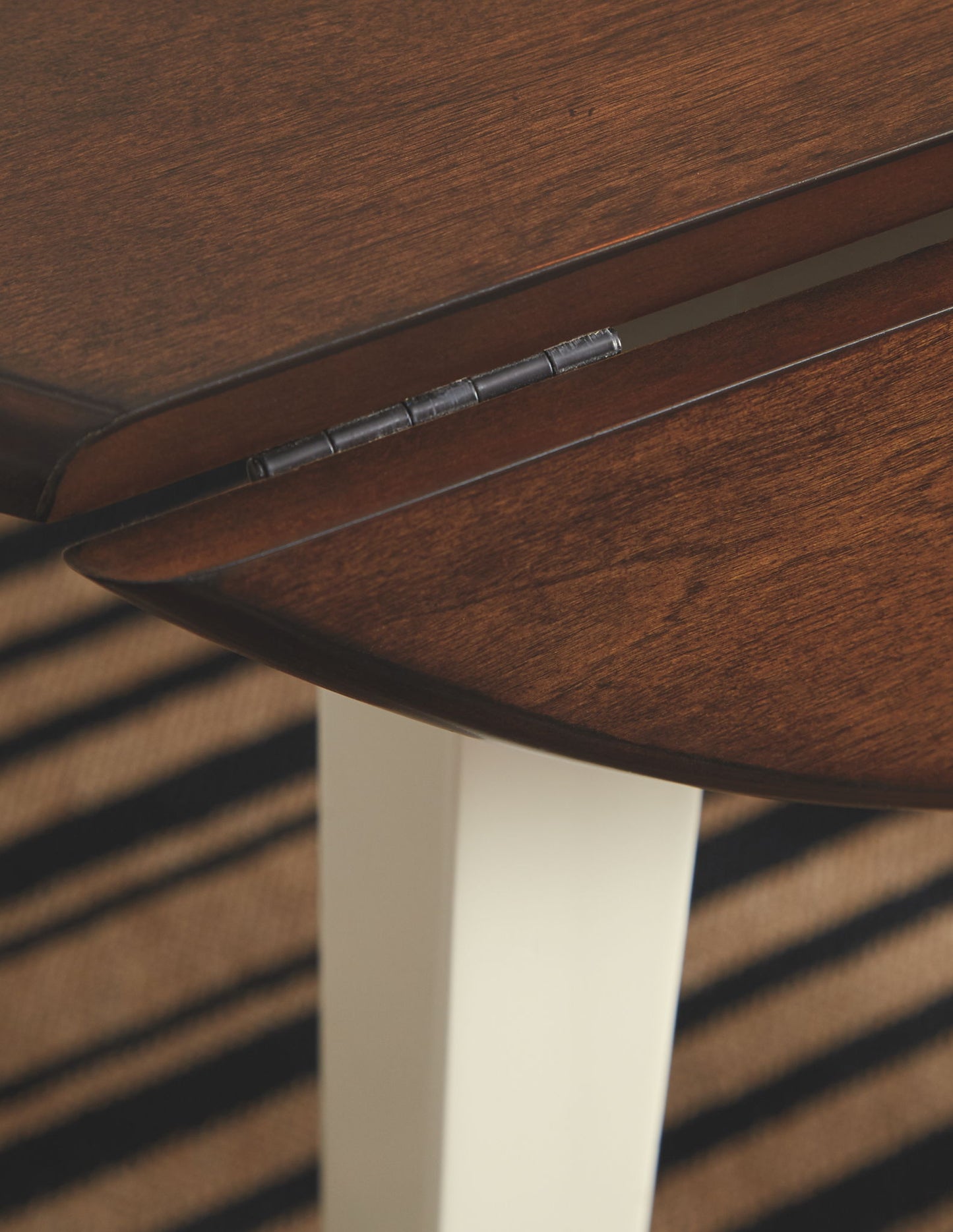 Woodanville - Cream / Brown - Round DRM Drop Leaf Table - Hornell Furniture Outlet