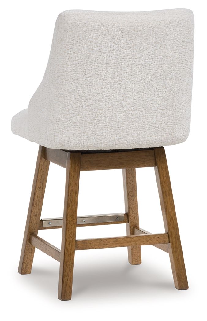 Cabalynn - Oatmeal / Light Brown - Upholstered Swivel Barstool (Set of 2) - Hornell Furniture Outlet