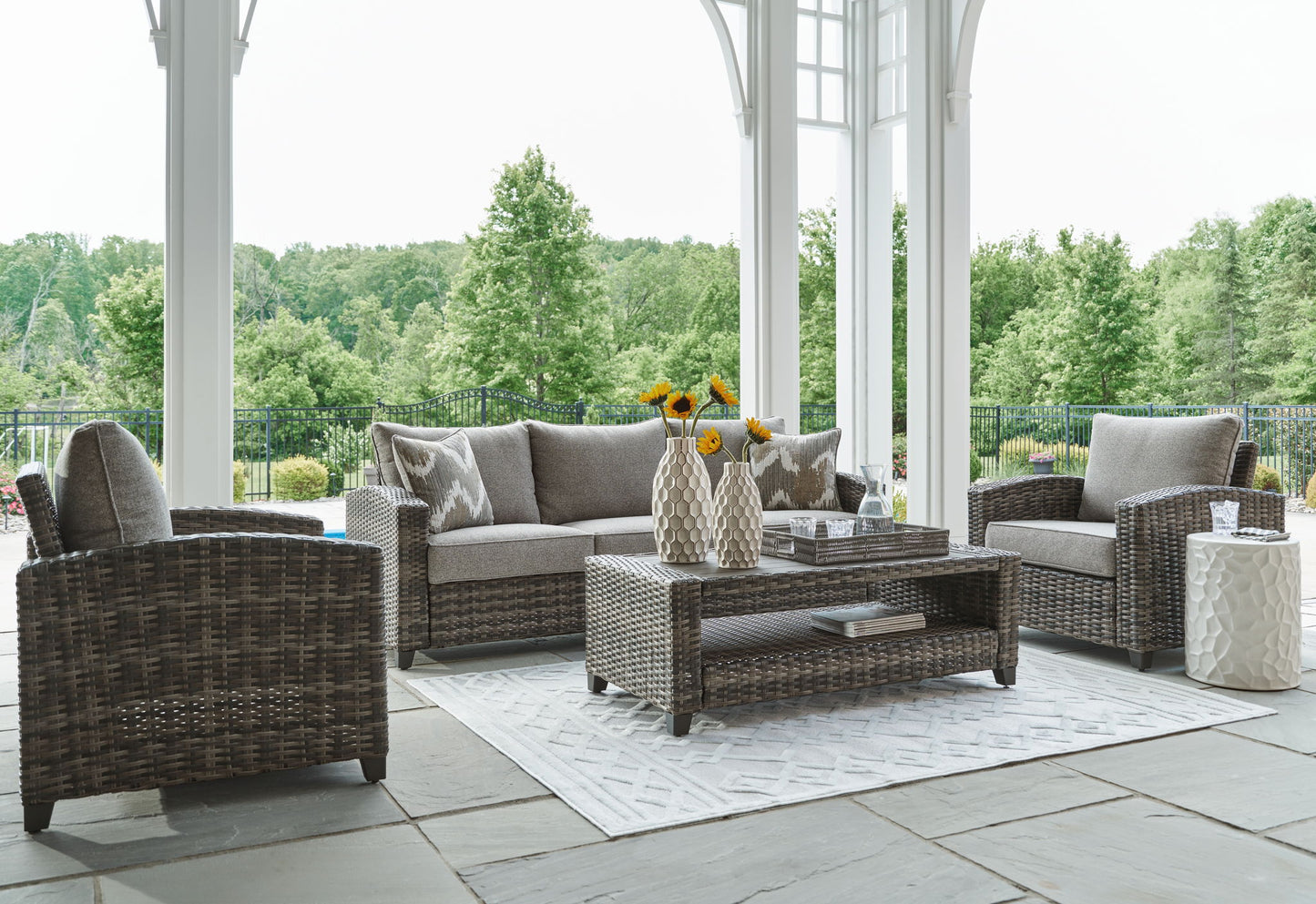 Oasis Court - Gray - Sofa, Chairs, Table Set (Set of 4) - Hornell Furniture Outlet