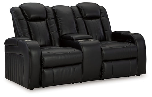 Caveman Den - Midnight - Power Reclining Loveseat with Console/ Adj Hdrst - Hornell Furniture Outlet