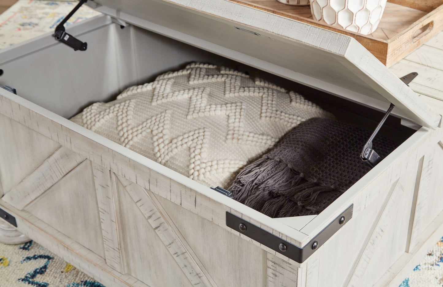 Carynhurst - Whitewash - Cocktail Table with Storage - Hornell Furniture Outlet