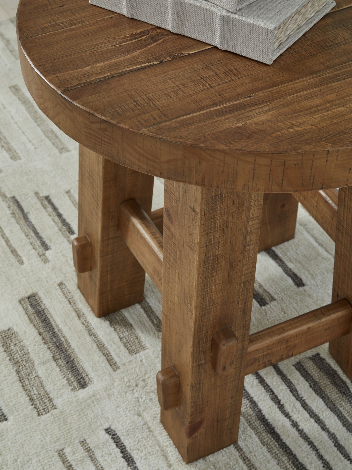 Mackifeld - Warm Brown - Round End Table - Hornell Furniture Outlet