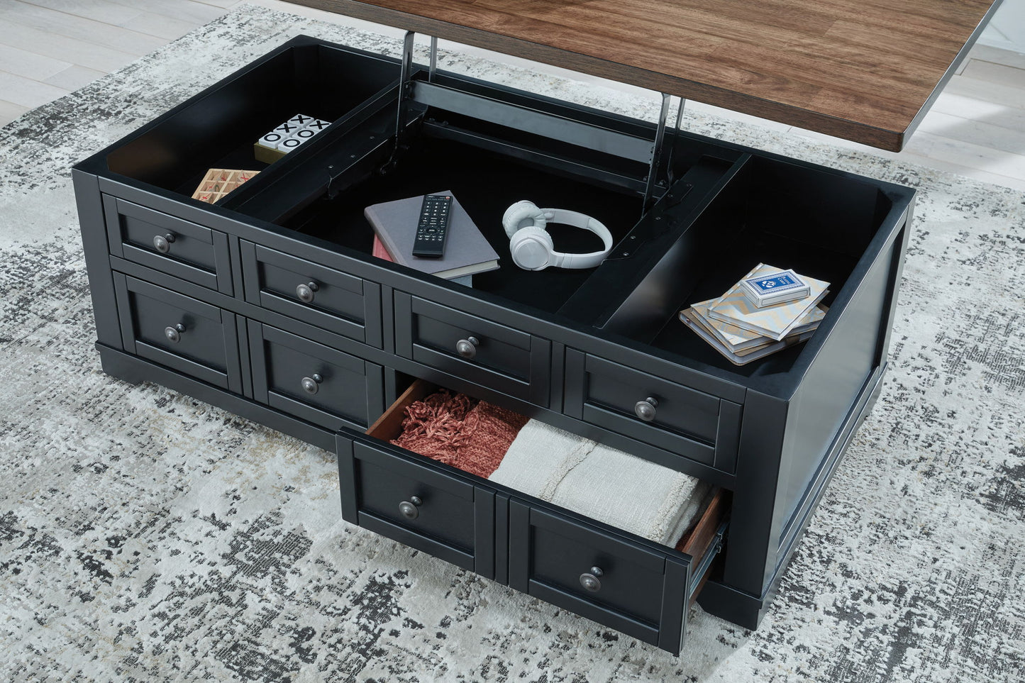Wildenauer - Brown / Black - Lift Top Cocktail Table - Hornell Furniture Outlet