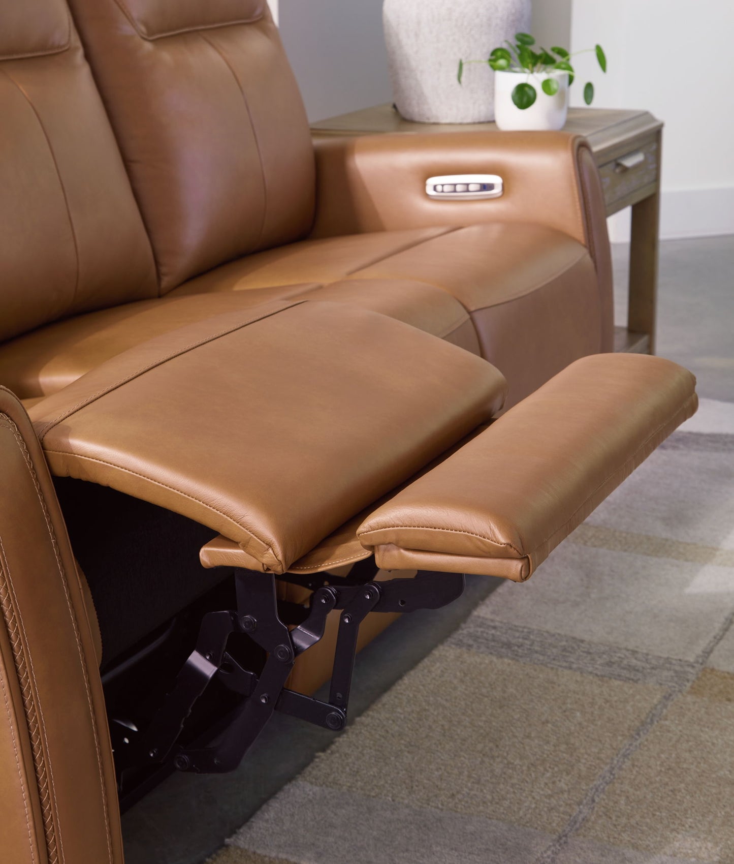 Tryanny - Butterscotch - Power Reclining Loveseat/ Adj Headrest - Hornell Furniture Outlet
