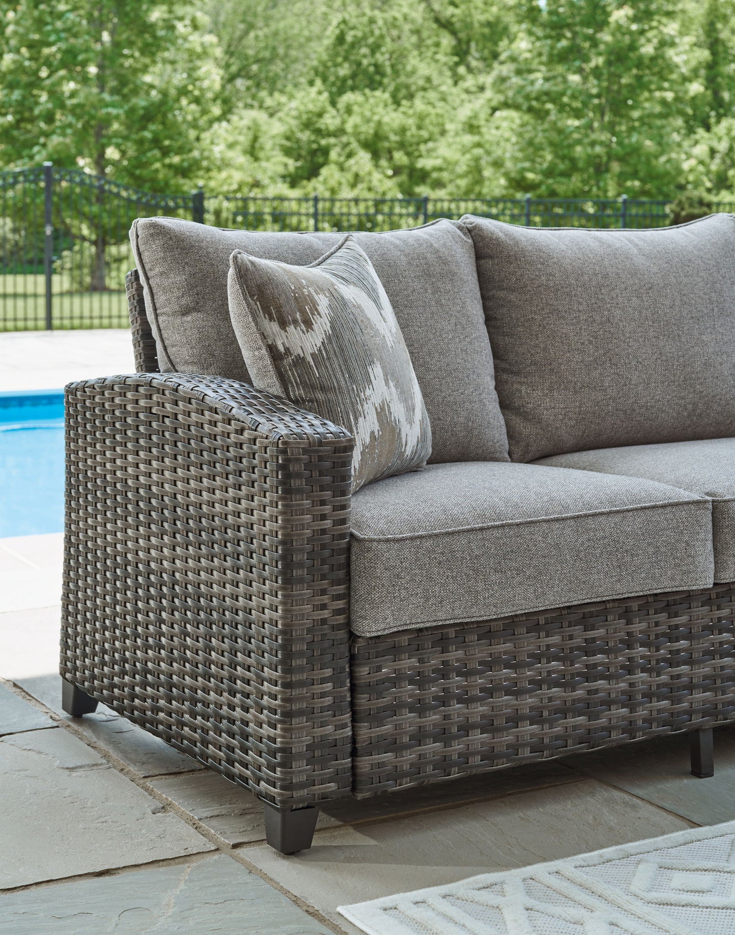 Oasis Court - Gray - Sofa, Chairs, Table Set (Set of 4) - Hornell Furniture Outlet