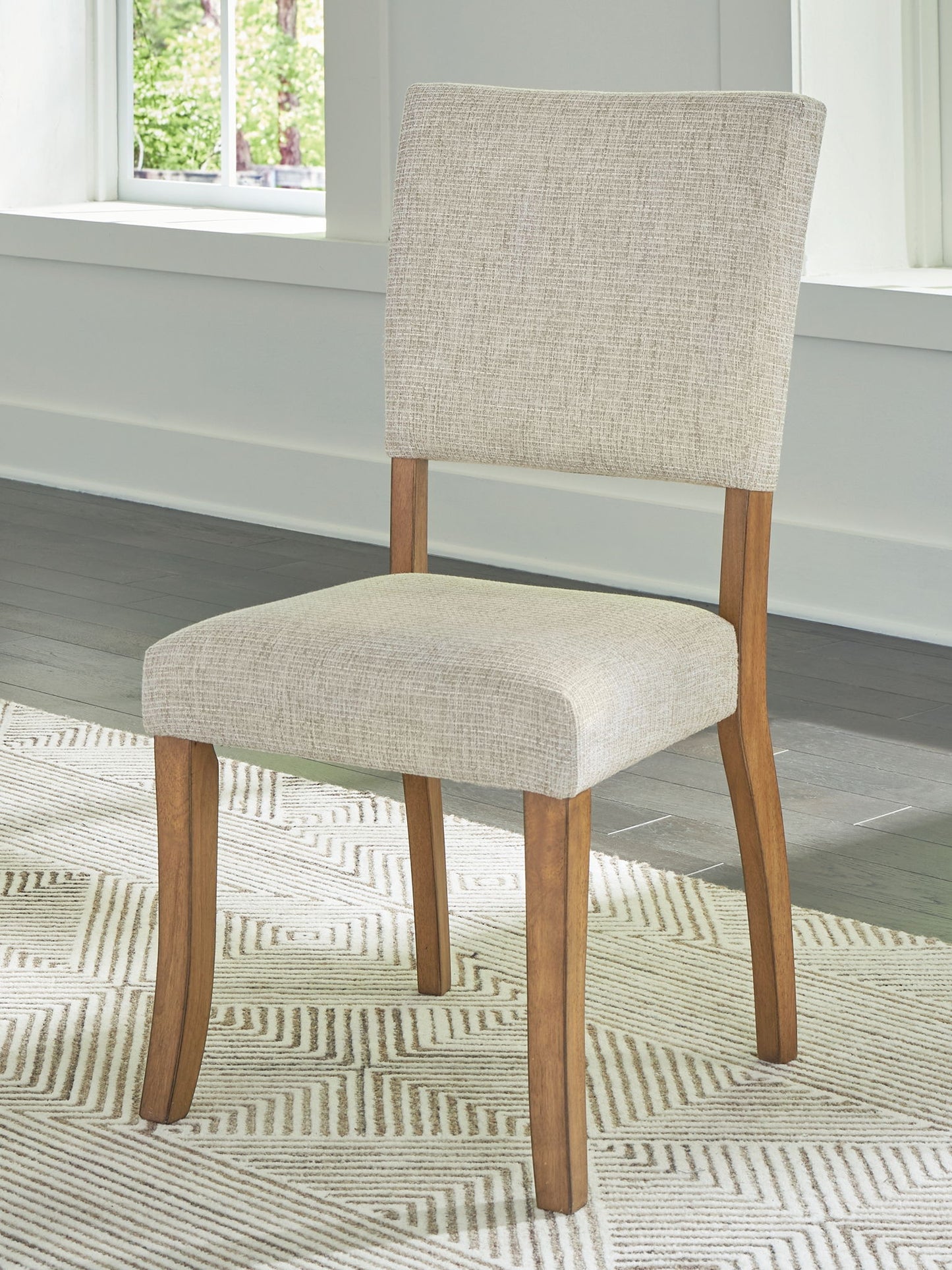 Rybergston - Light Brown - Dining Upholstered Side Chair (Set of 2) - Hornell Furniture Outlet