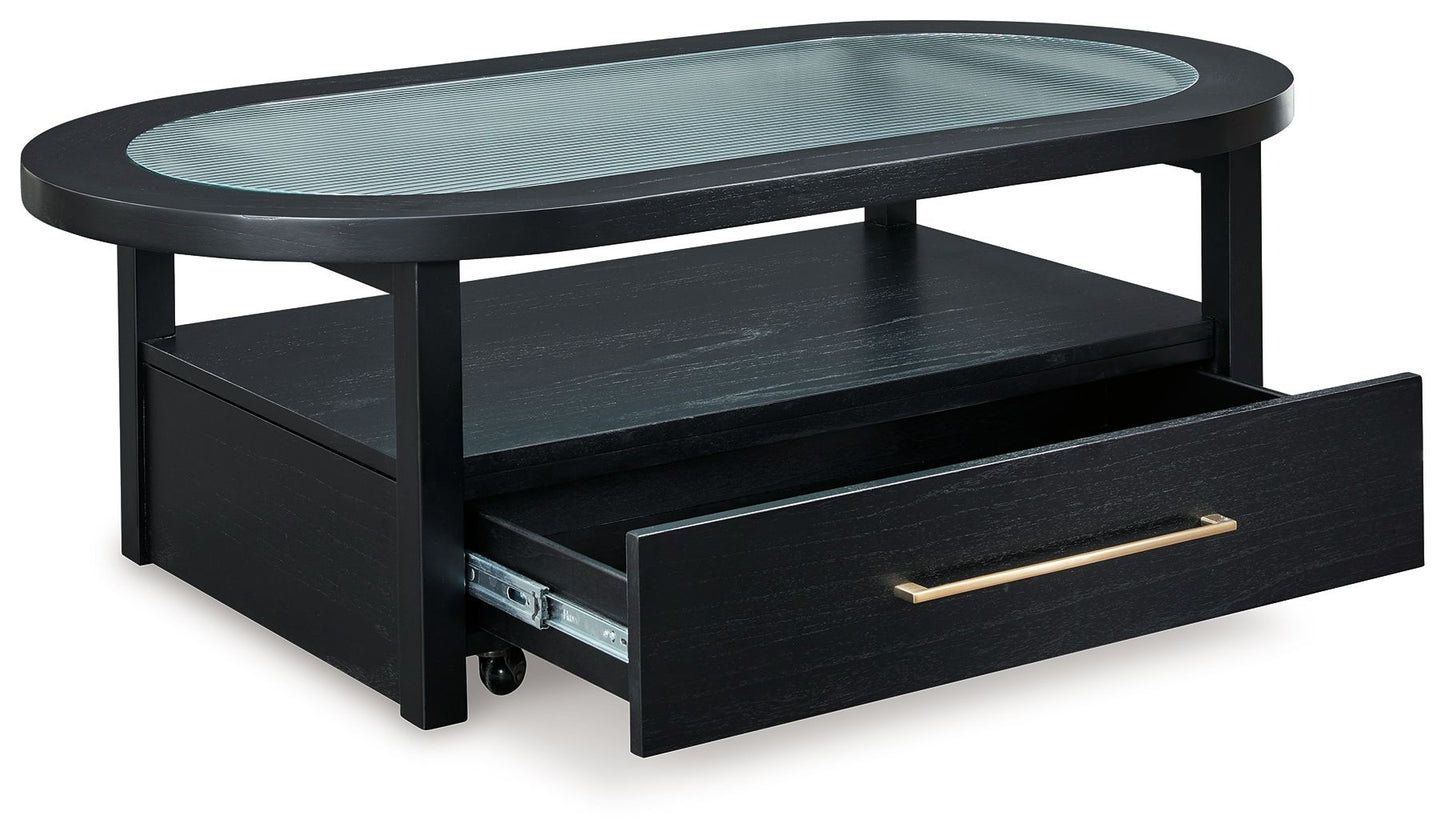 Winbardi - Black - Oval Cocktail Table - Hornell Furniture Outlet