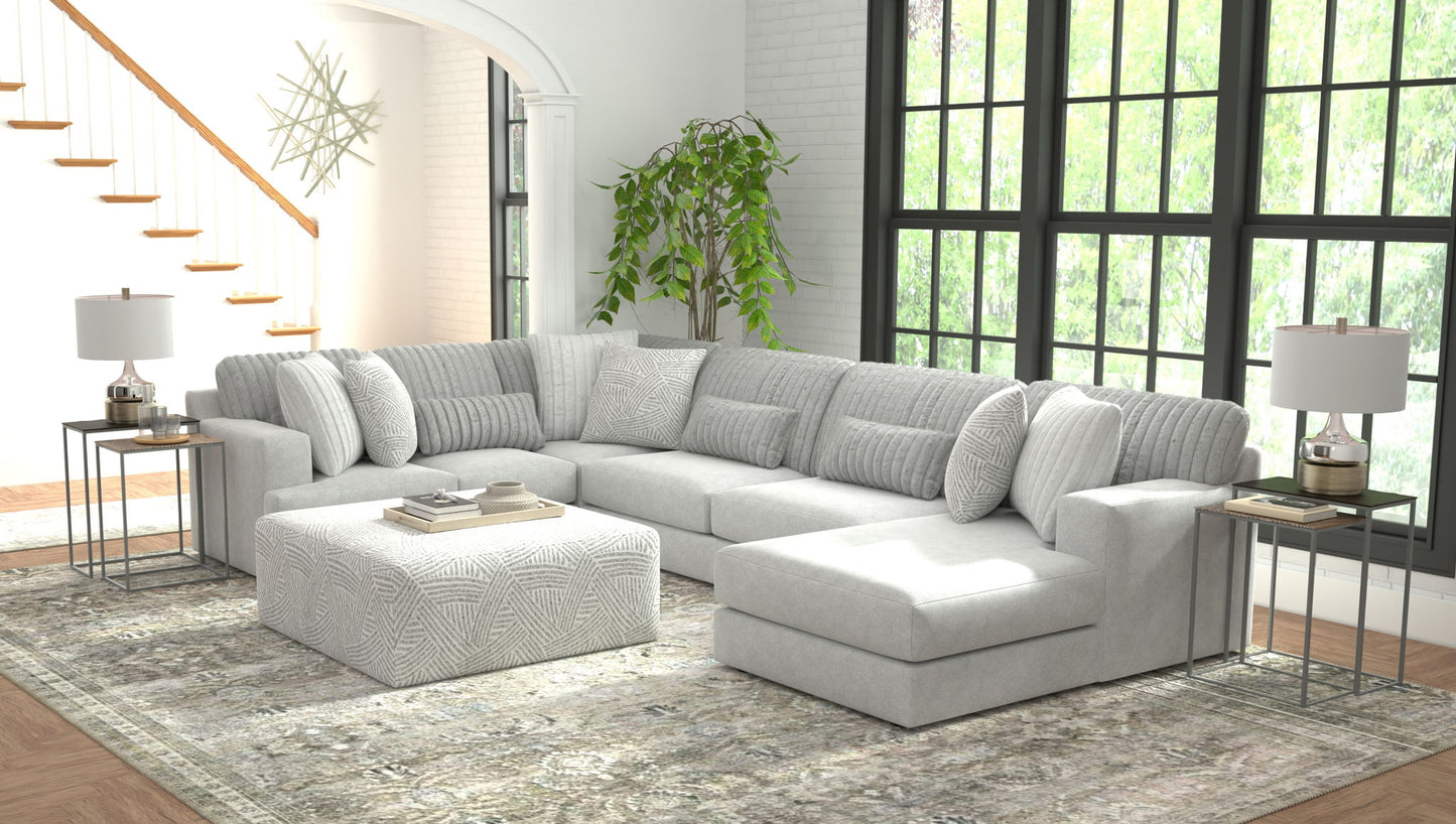 Logan - Upholstered Sectional With Comfort Coil Seating - 46" Cocktail Ottoman And Accent Pillows Included - Hornell Furniture Outlet