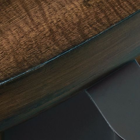 Kraeburn - Brown / Black - Round End Table - Hornell Furniture Outlet