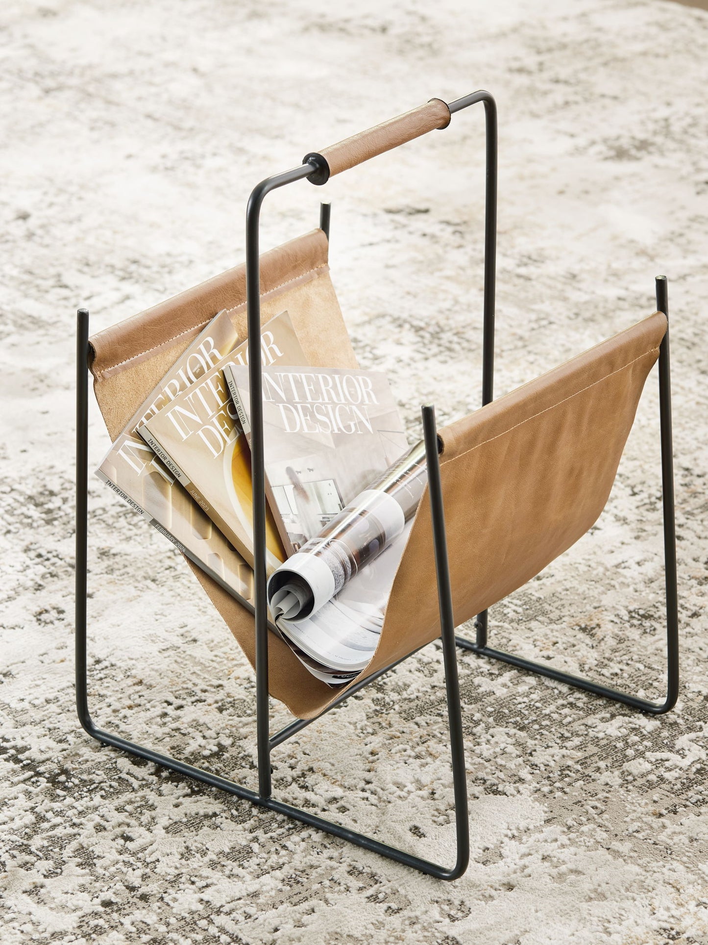 Faronworth - Brown / Black - Magazine Rack - Hornell Furniture Outlet