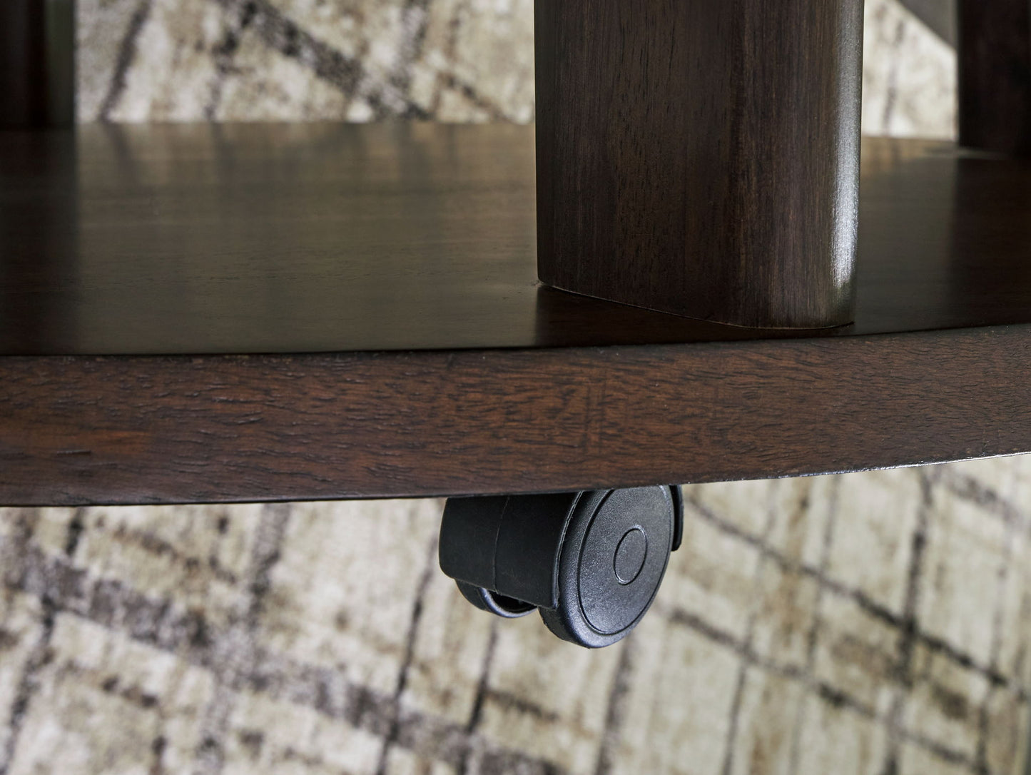 Korestone 2 - Dark Brown - Round Cocktail Table - Hornell Furniture Outlet