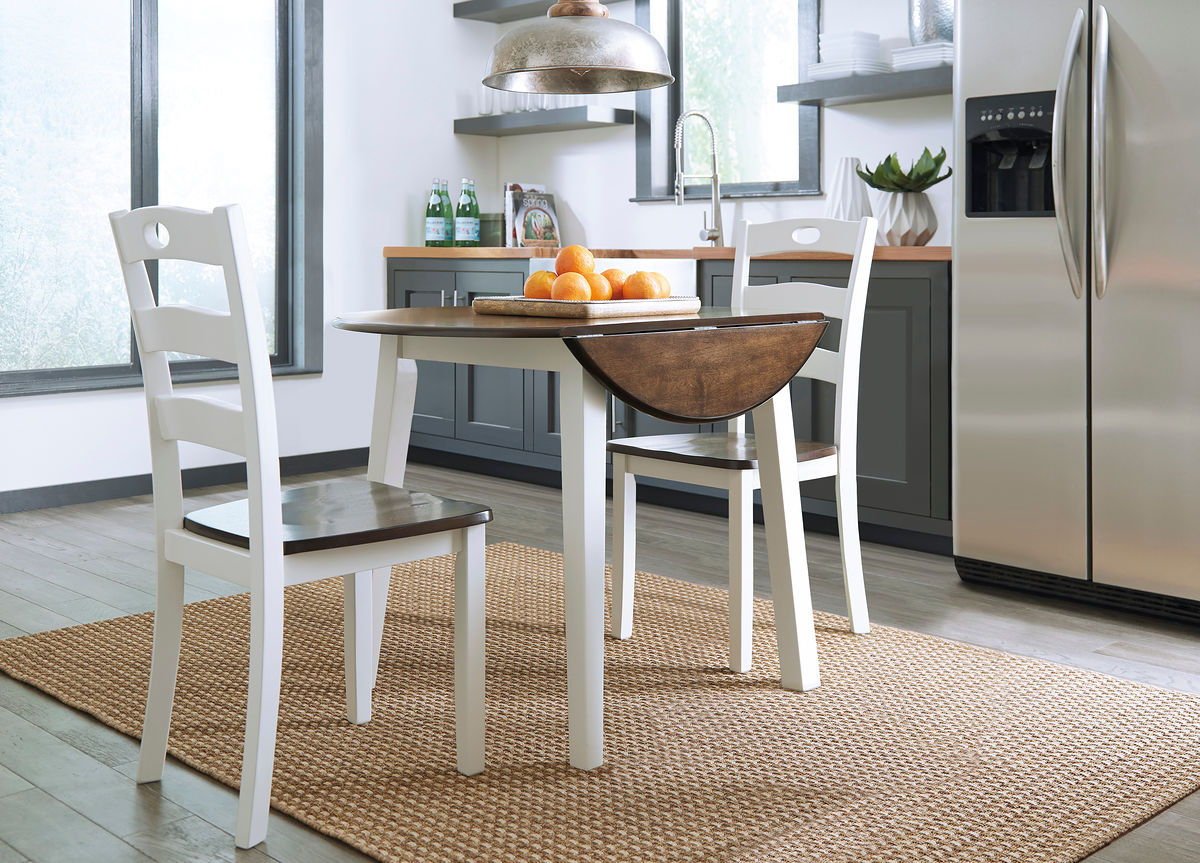 Woodanville - Round Dining Table Set - Hornell Furniture Outlet