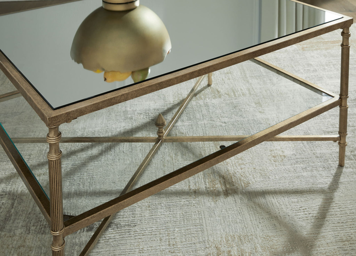 Cloverty - Aged Gold Finish - Rectangular Cocktail Table - Hornell Furniture Outlet