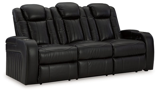 Caveman Den - Midnight - Power Reclining Sofa With Adj Headrest - Hornell Furniture Outlet