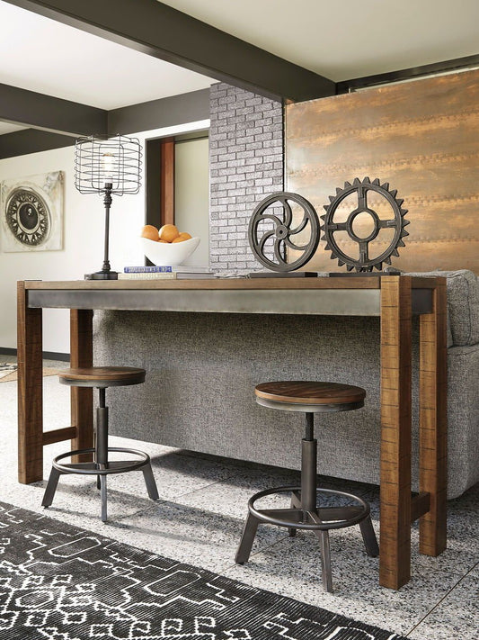 Torjin - Dark Brown - 3 Pc. - Long Counter Table, 2 Stools - Hornell Furniture Outlet