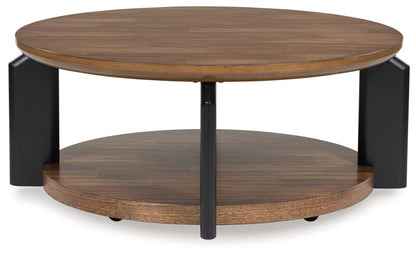Kraeburn - Brown / Black - Round Cocktail Table - Hornell Furniture Outlet