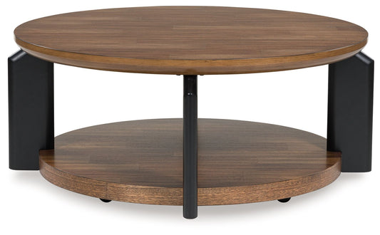 Kraeburn - Brown / Black - Round Cocktail Table - Hornell Furniture Outlet
