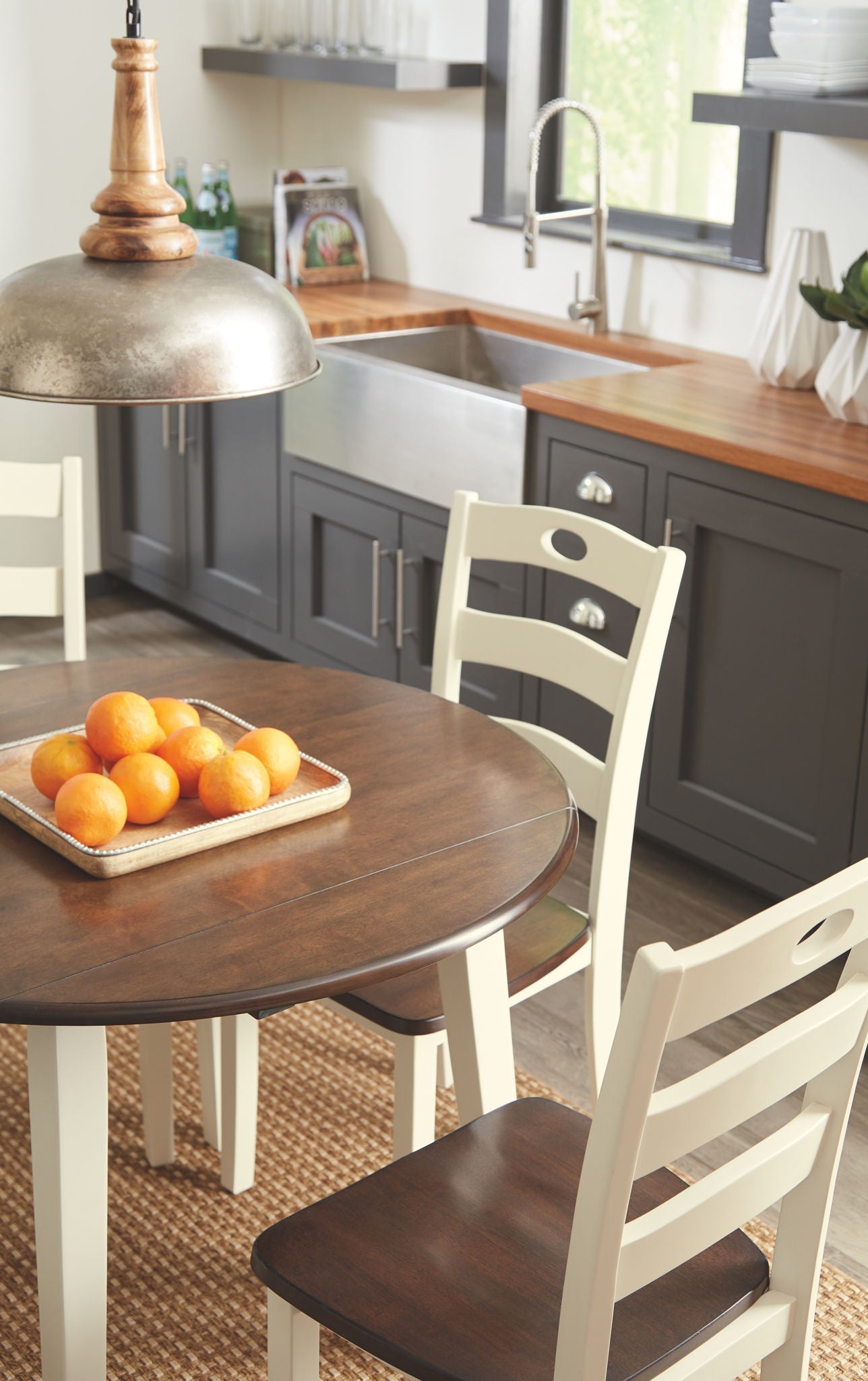 Woodanville - Round Dining Table Set - Hornell Furniture Outlet