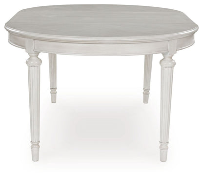 Montelaine - Antique White - Oval Dining Room Extension Table - Hornell Furniture Outlet