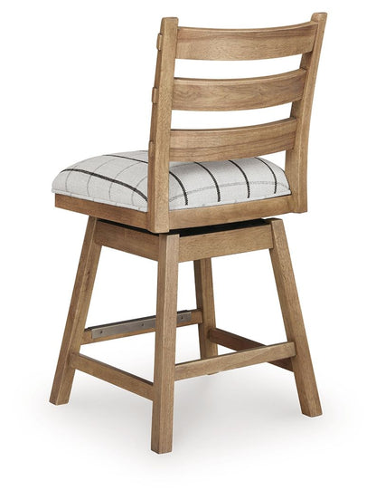 Ridgester - Upholstered Swivel Barstool (Set of 2) - Light Brown - Hornell Furniture Outlet