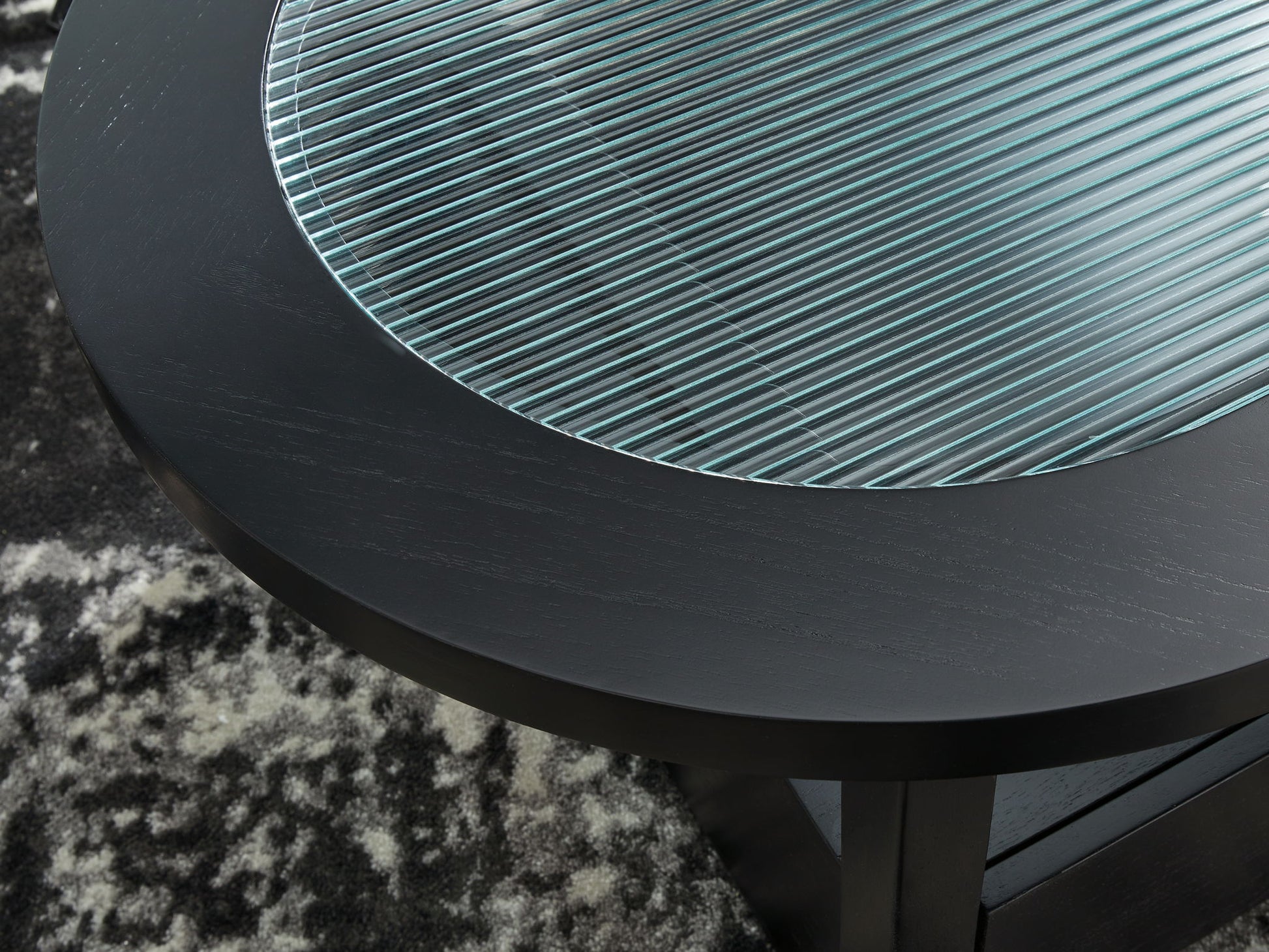 Winbardi - Black - Oval Cocktail Table - Hornell Furniture Outlet