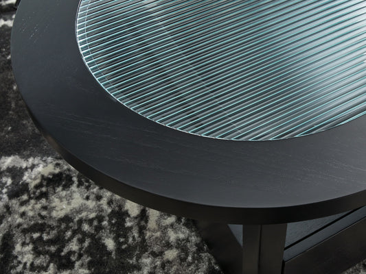 Winbardi - Black - Oval Cocktail Table - Hornell Furniture Outlet