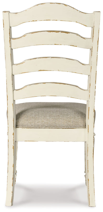 Realyn - Chipped White - Dining UPH Side Chair (Set of 2) - Ladderback - Hornell Furniture Outlet