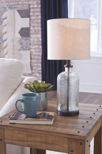 Bandile - Clear / Bronze Finish - Glass Table Lamp - Hornell Furniture Outlet