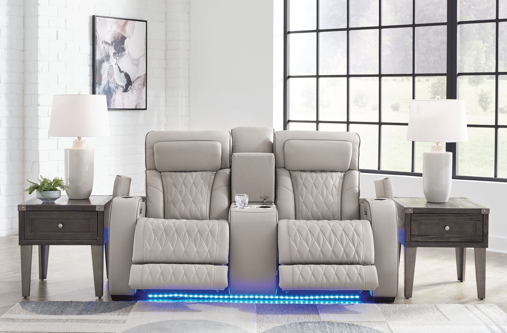 Boyington - Power Reclining Loveseat With Console/Adj Hdrst - Hornell Furniture Outlet