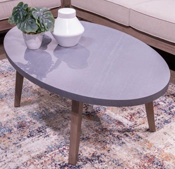 Harmony Headlands - Natural / Gray - Oval Cocktail Table - Hornell Furniture Outlet