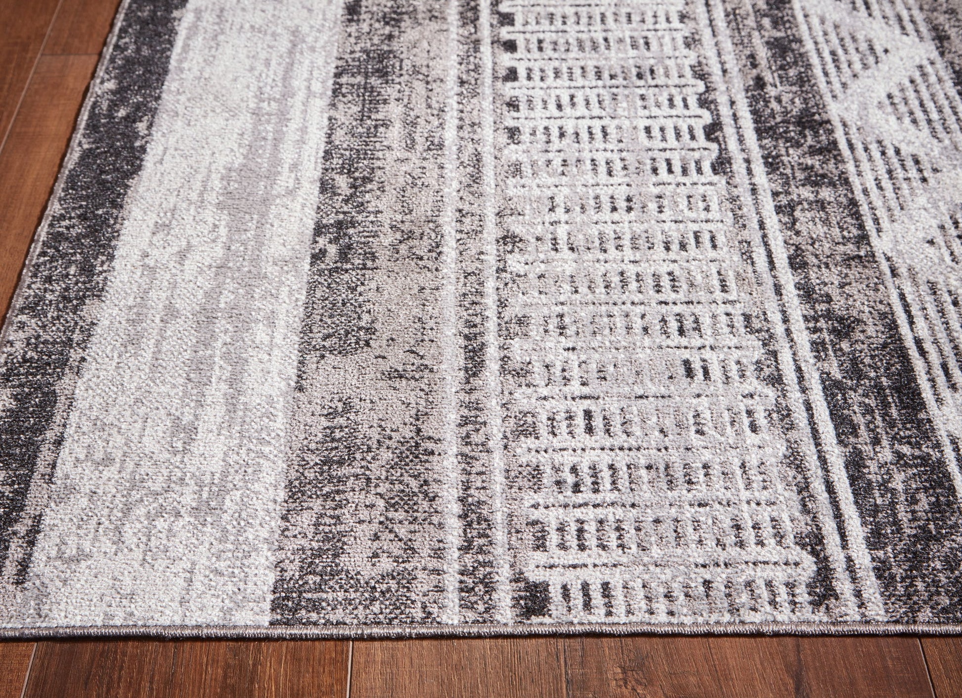 Henchester - Rug - Hornell Furniture Outlet